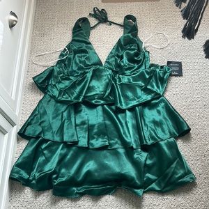 This dress is from Lulus. It is a size large and emerald green.